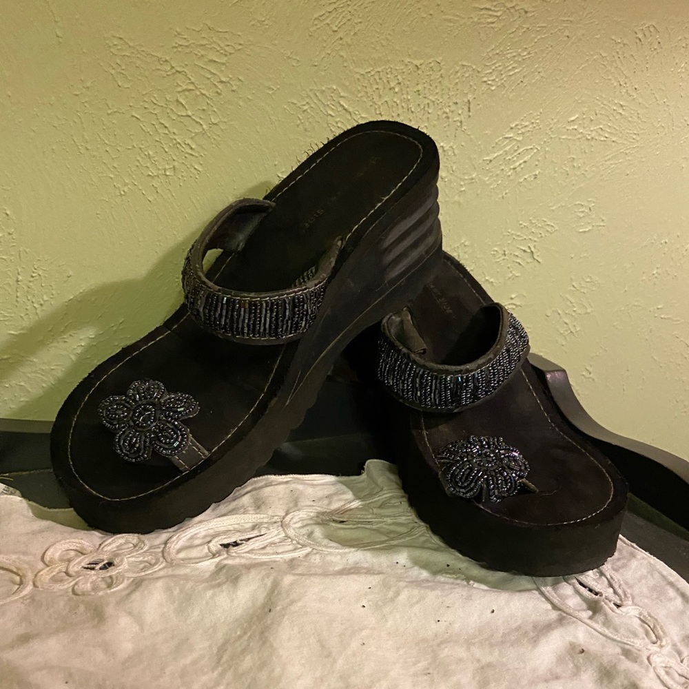 Lower East Side toe platform sandals.